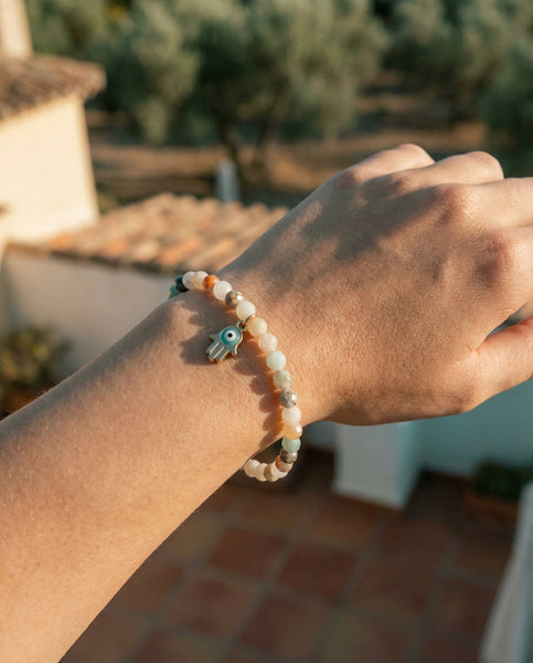 Handmade natural Amazonite healing bracelet with soothing mint green gemstone beads. A spiritual jewelry piece for communication, emotional balance, and Throat Chakra healing by Oneness Living. 100% vegan.
