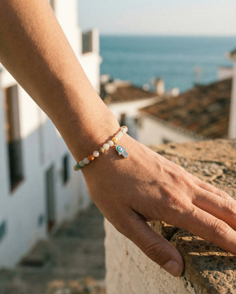 Handmade natural Amazonite healing bracelet with soothing mint green gemstone beads. A spiritual jewelry piece for communication, emotional balance, and Throat Chakra healing by Oneness Living. 100% vegan.