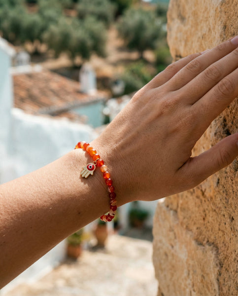 Handmade natural Carnelian healing bracelet with vibrant orange gemstone beads. A spiritual jewelry piece for motivation, creativity, and Sacral Chakra healing by Oneness Living. 100% vegan.