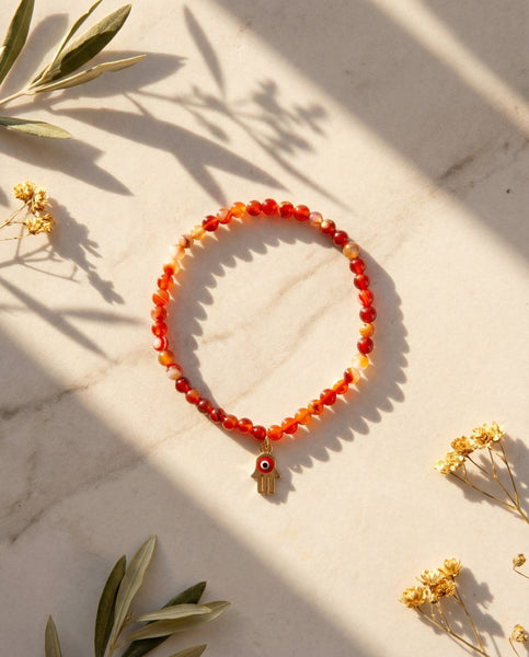 Handmade natural Carnelian healing bracelet with vibrant orange gemstone beads. A spiritual jewelry piece for motivation, creativity, and Sacral Chakra healing by Oneness Living. 100% vegan.