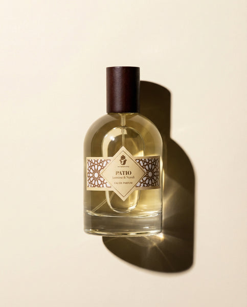 Luxury 100ml bottle of Patio Eau de Parfum by Oneness Living. A rich jasmine and tuberose floral fragrance inspired by a fresh Andalusian garden.
