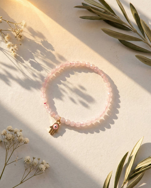 Handmade natural Rose Quartz healing bracelet with soft pink gemstone beads. A spiritual jewelry piece for unconditional love, self-care, and Heart Chakra healing by Oneness Living. 100% vegan.