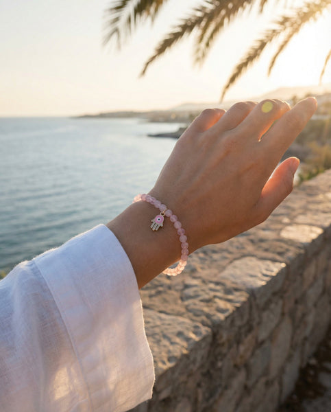 Handmade natural Rose Quartz healing bracelet with soft pink gemstone beads. A spiritual jewelry piece for unconditional love, self-care, and Heart Chakra healing by Oneness Living. 100% vegan.